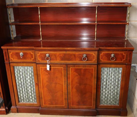 A Regency style satinwood banded mahogany breakfront secretaire cabinet, W.152cm, D.50cm, H.138cm